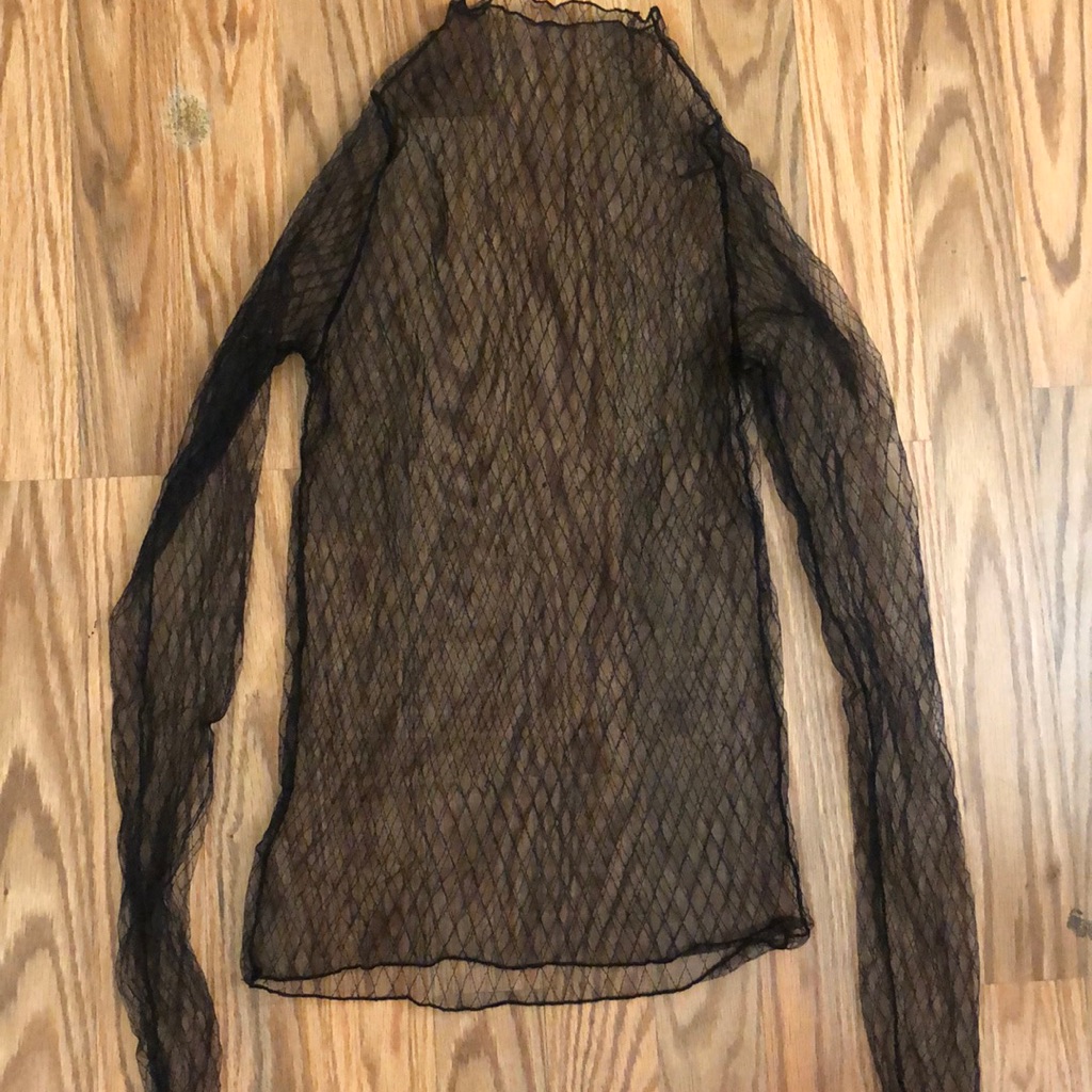 A mesh or fishnet top photographed for a US retail listing in September 2026